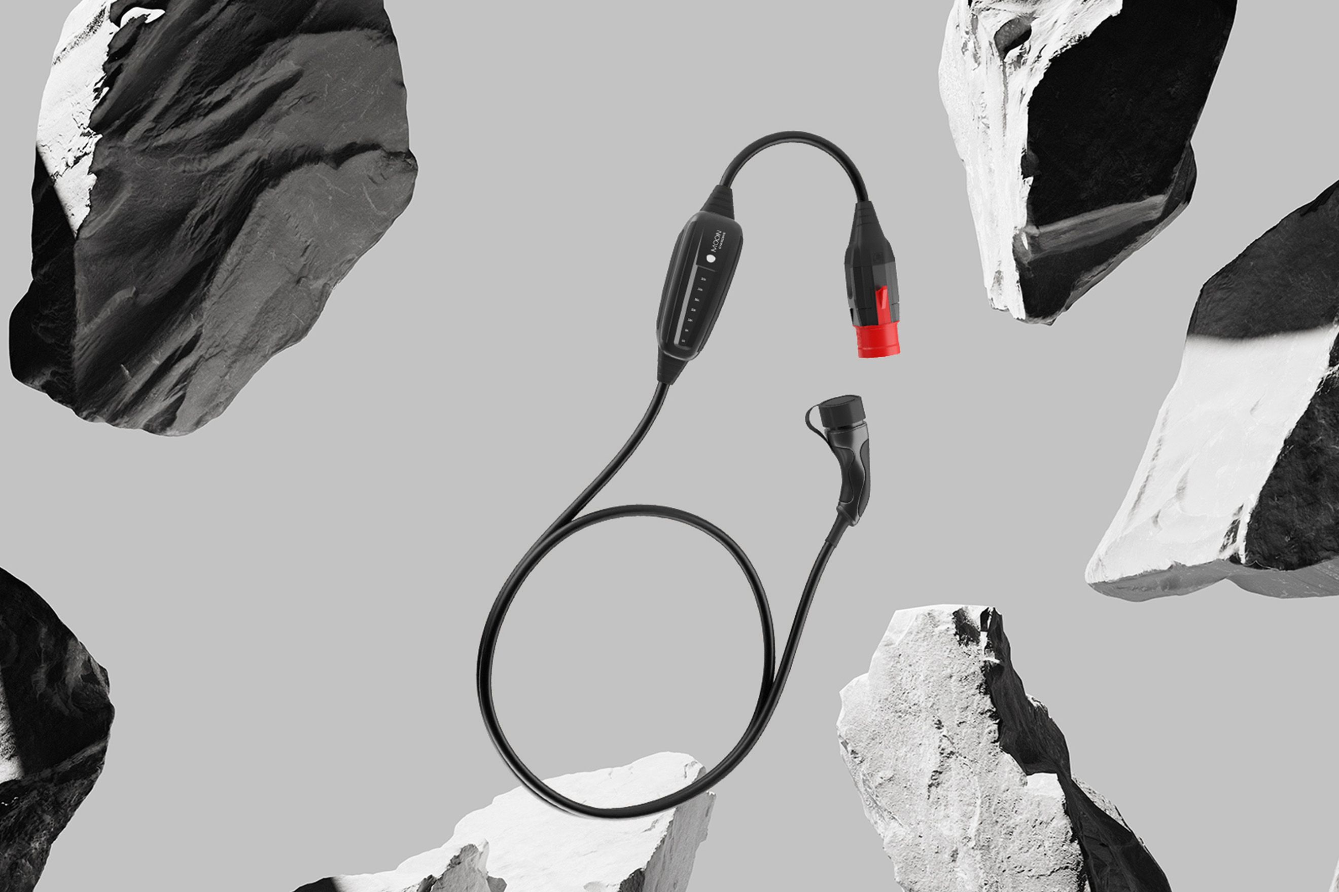 blue cable between several boulders